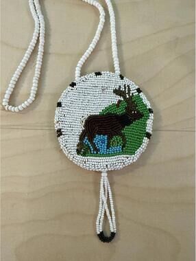 Vintage beaded Native American medallion elk tie Navajo necklace  beaded tassel